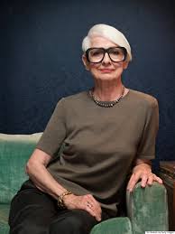 Grown up Alice in big glasses